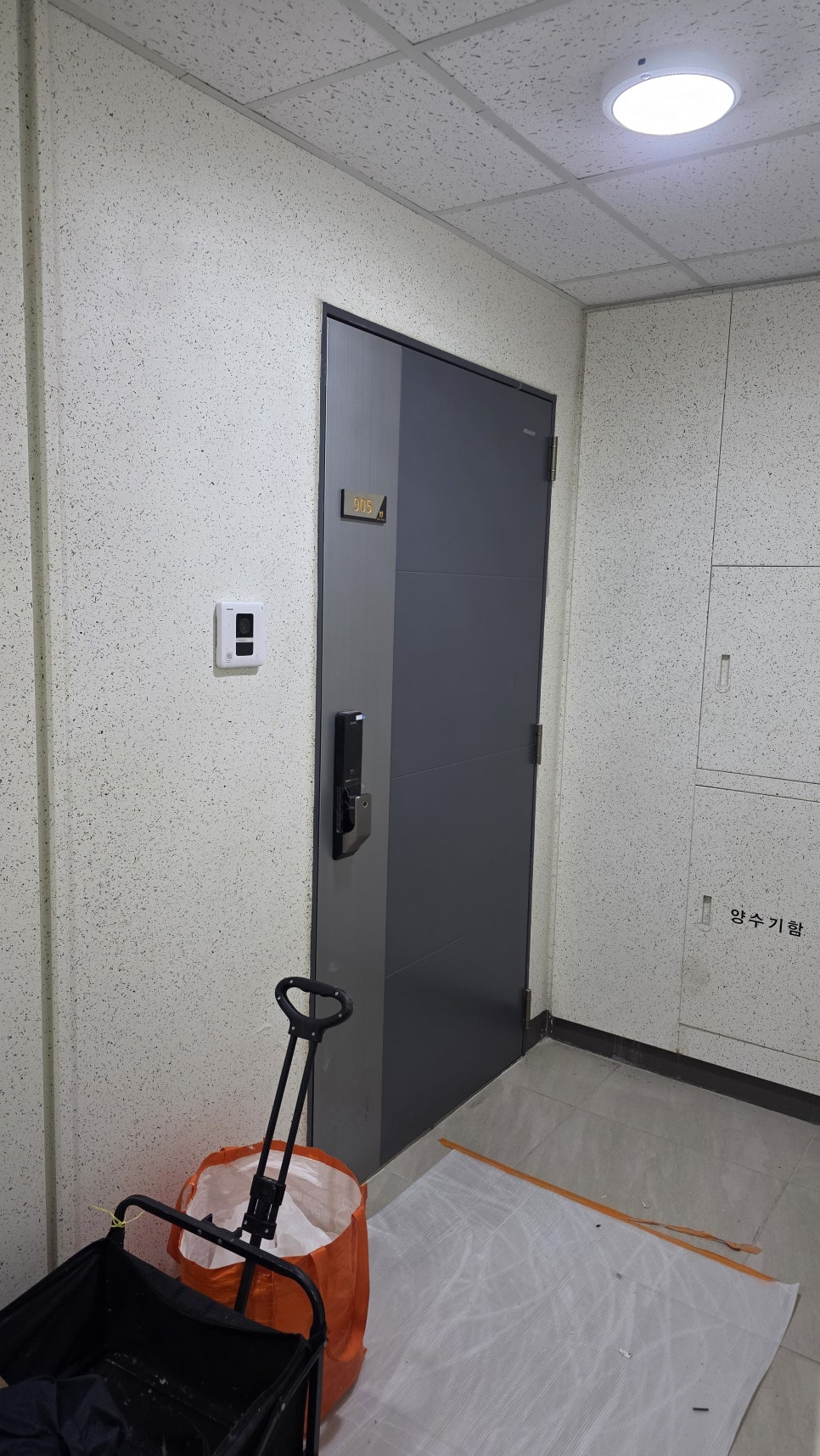 Apartment fire door protected before hinge adjustment